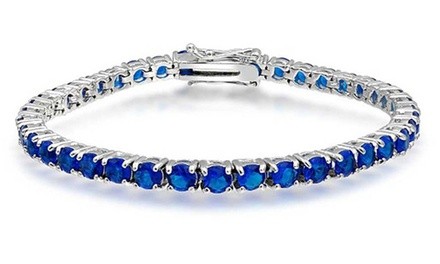 7.00 CTTW Round Cut Sapphire Tennis Bracelet in 18K White Gold Plating