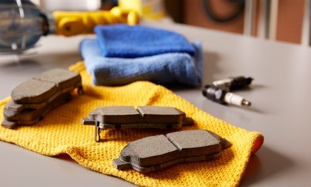 Brake-Pad Replacement for One Axle or Brake Fluid Flush at Macky Repair (Up to 20% Off)