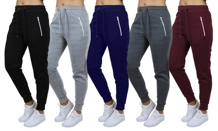 4-Pack Women's Loose-Fit Fleece Joggers with Zipper Pockets (S-2XL). Plus Sizes Available.