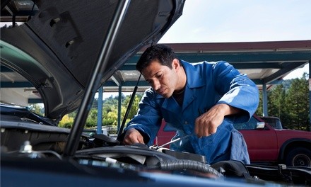 Auto Maintenance or Emissions Services at Carr's Auto & Truck Repair (Up to 55% Off). Two Options Available.