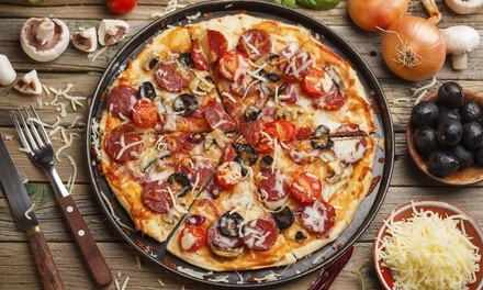 Up to 50% Off on Pizza Place at Caribbean Pizza