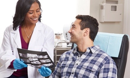 Dental Exam with Pano Scan or X-Ray and Cleaning at Orange Coast Cosmetic Dentistry (Up to 84% Off)