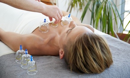 $38 for a Swedish Massage with Thai Yoga, Cupping, or Reflexology at Xscape Massage & Spa ($73 Value)