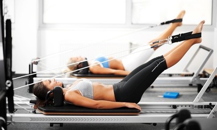 $15 for One Drop-In Class at Club Pilates Queen Anne ($29 Value)