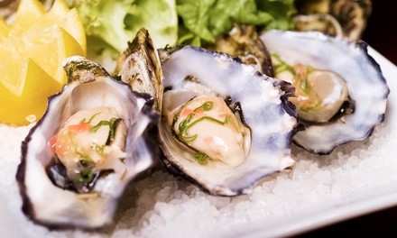 $43 for Two Dozen East Coast Blue Point Oysters and Two Drinks at Eats on Lex ($102 Value)