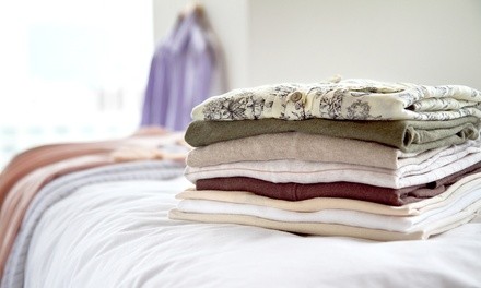 Wash and Fold or Iron Laundry Services at Wash N Fun Laundromat (Up to 60% Off). Three Options Available.