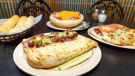 Up to 37% Off on Pizza Place at Mancino's Pizza & Grinders