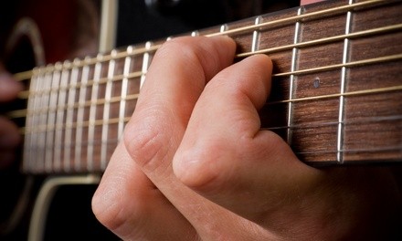 $39 for Four Guitar Lessons from Mike Westbrock at Music Go Round (Up to $90 Value) 