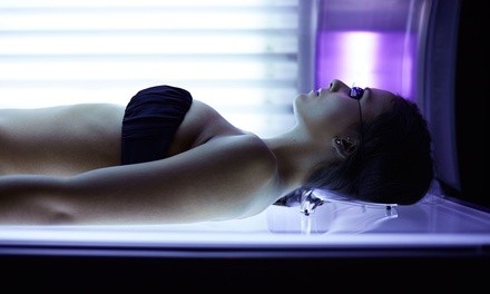 Tanning in a Low Pressure Bed at Spree Tanning Salon (Up to 55% Off).