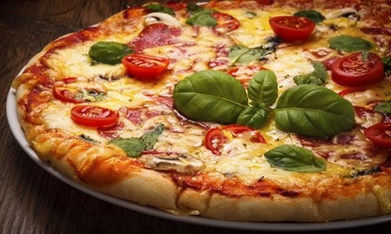 Pizza and Pasta for Dine-In, Takeout, or Catering at Plum Tomatoes (Up to 50% Off)