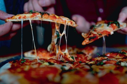 $10 For $20 Worth Of Pizza, Wings & More (Also Valid On Take-Out W/Min. Purchase Of $30)