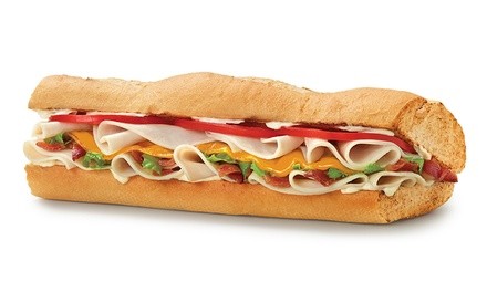 Regular Sandwiches, Bags of Chips and Medium Drinks at Quiznos (Up to 50% Off)