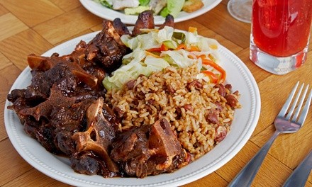 Jamaican Food and Drink or Catering Service at Delphine's Jamaican Restaurant (Up to 30% Off)