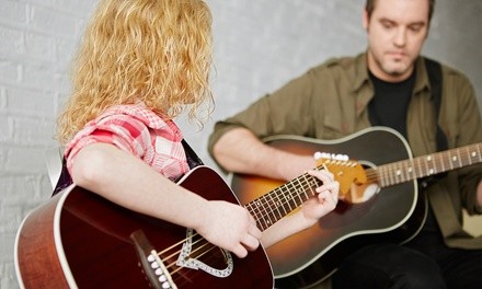 One or Two 30-Minute Online  Guitar, Bass, Ukulele, or Piano Classes at Guitar Chicago (Up to 51% Off)