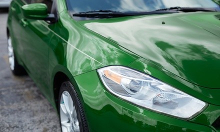 $55 for $125 for One Headlight Restoration Services at Curt's Carwash and Emission