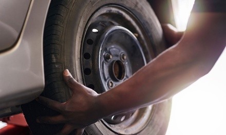 Four Tires with Installation or Automotive Service or Repair at BlueSky Tire & Auto Service (Up to 40% Off)