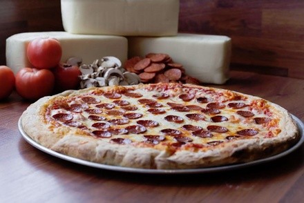 Pizza, Wings, Subs, and More at Mike's Subs (Up to 48% Off). Three Options Available.