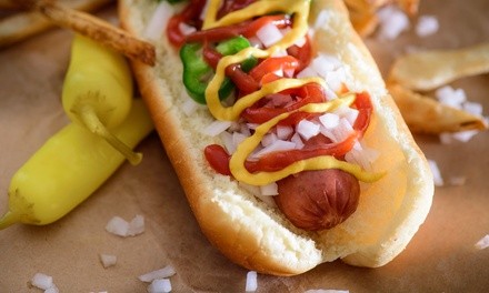 One Bacon Bourbon Dog, Veggie Dog, Jerk Dog, or Family Meal Deal at Old Dogs New Tricks (Up to 52% Off)