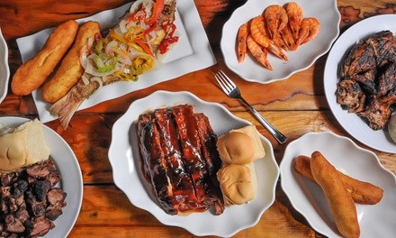 Jamaican Food at Tropics Jerk Center (Up to 50% Off). Two Options Available.