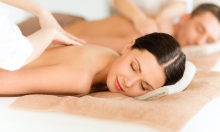 60-Minute Couples Massage with Optional Sauna Therapy at Massage Green Spa (38% Off). Two Locations Available.