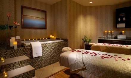 50- or 80-Minute Couples Swedish or Deep-Tissue Massage with One Enhancement Each at Spa 950 (Up to 35% Off)