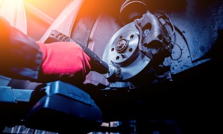 One or Two Axles of Brake Pads and Rotor Replacement with Oil Change at Midwest Auto Care (Up to 28% Off)