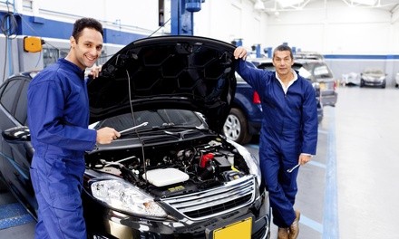 Conventional or Synthetic Oil Change, or Tire Swap with Alignment Check at Zia Automotive (Up to 57% Off)