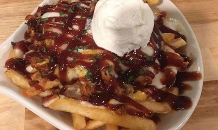 $7 for $10 Towards Food and Drink for Takeout or Dine-In (When Available) at Johnny's Place