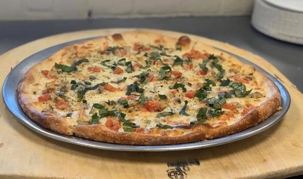 Pizza and Subs at Moravela's Pizza (Up to 40% Off). Two Options Available.