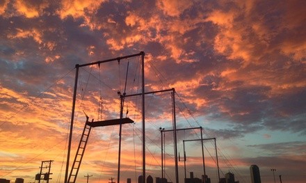 Flying Trapeze Class w/ Photos or Photo & Merchandise Package at Skyline Trapeze (Up to 40% Off). Three Options.