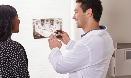 Exam with X-Ray, Cleaning and Optional Teeth Whitening at The Smilist (Up to 76% Off)