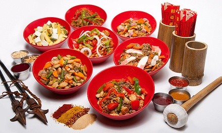 Asian Food and Drink for Takeout and Dine-In if Available at Genghis Grill (Up to 30% Off). 2 Options Available.