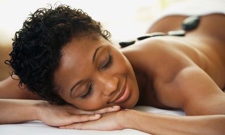 $80 for Spa Package w/Massage, Himalayan Stones, Scrub, & Wrap at Nature’s Enlightened Touch ($125 Value)