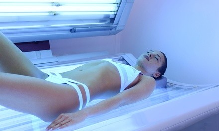 Tanning Sessions or Package at Sunny Kisses Tanning Salon And Spa (Up to 57% Off). Three Options Available.