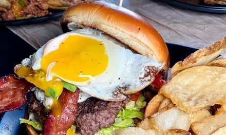 

$14 for $20 Worth of Food and Drink for Takeout or Dine-In When Available at Eye Burger by Tuerto
