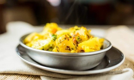 Indian Cuisine at Kabila Sweets and Restaurant (Up to 20% Off). Two Options Available.