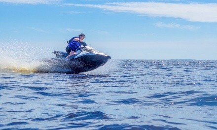 Jet Ski Rental with Beach Set or Dolphin Tour for Up to Two at Laguna's on Pensacola Beach (Up to 27% Off)