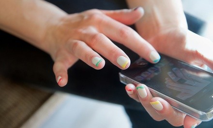 Screen Repair for an iPhone, Samsung Galaxy, or iPad at 911 Phone Repair (Up to 65% Off). Six Options Available.