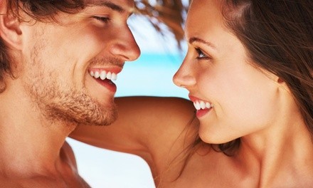 Two Mystic Spray Tans or One Month of Unlimited Low-Pressure Tanning  at Sun Studio Tanning (Up to 65% Off)