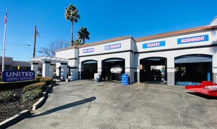 Semi- or Full-Synthetic Oil Change with Tire Rotation at United Auto Repair (Up to 48% Off)