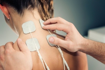 One or Three Sessions of Electric Stimulation and Chiropractic Exam at Orlando Injury Medicine (Up to 83% Off)