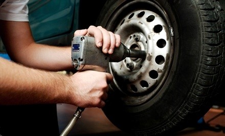 Wheel Alignment with Optional 12-Month Warranty at Mac's Auto Care (Up to 51% Off)