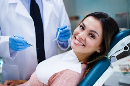 $49 for Dental Exam, X-Ray, and Cleaning at Family Smiles Dental Care ($355 Value)