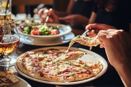 Up to 44% Off on Pizza Place at East Coast Crust