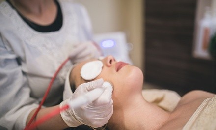 Six or Twelve Face-Lift Sessions or Six Acne and Scarring Facial Treatments at LipoMelt (Up to 82% Off)