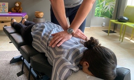 Chiropractic Package with Massage, One or Three Adjustments, and X-Rays at 100% Chiropractic (Up to 78% Off)