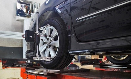 Wheel Alignment for Two or Four Wheels at Premier Auto Care (formerly Precision Tune Auto Care) (Up to 55% Off)