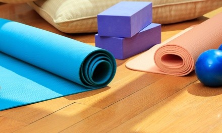 One Drop-In or One Month of Unlimited Yoga Classes at The Mat (Up to 60% Off)