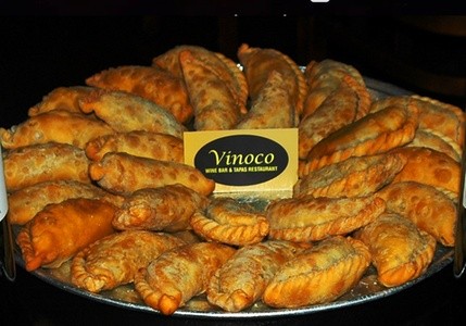 Lunch, Dinner, or Catering at Vinoco Wine Bar & Tapas Restaurant (Up to 52% Off). Three Options Available.