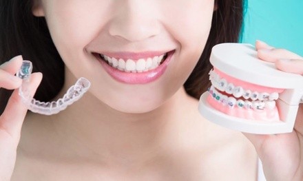 Dental Exam, and X-Ray or Complete Invisalign Treatment at Tomblyn Family Orthodontics (Up to 97% Off)